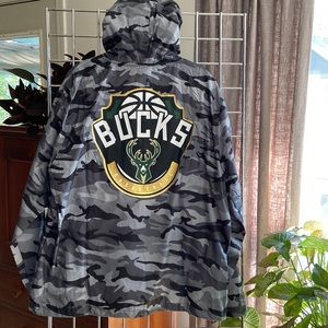 Jaqueta online new era camuflada